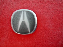 What Car Brand Has a V Shaped Logo?